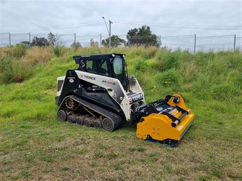 how much to rent a skid steer with mulcher|skid steer mulching attachment rental.